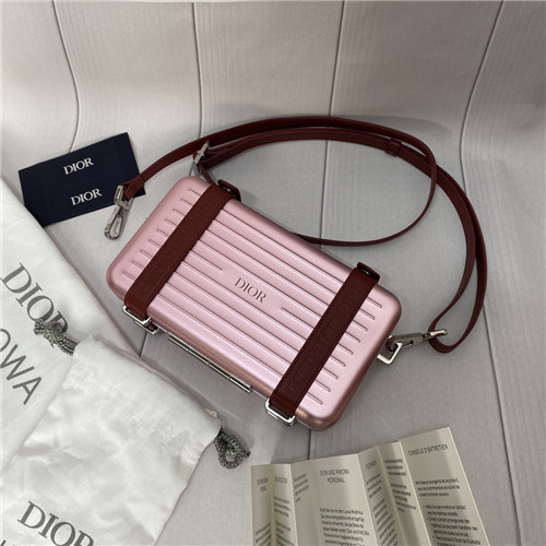dior and rimowa personal clutch