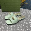 GuccI's new latest flat heel slippers are gold rhinestone snakehead sandals