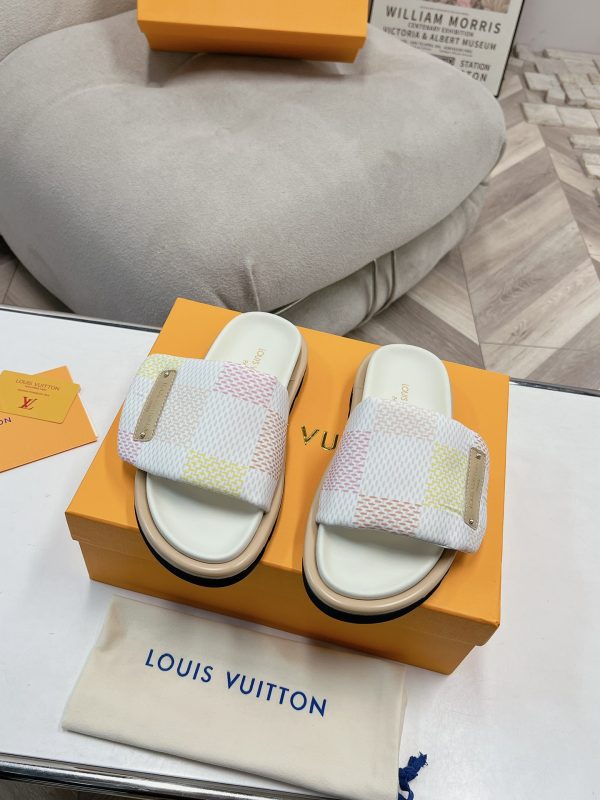 Louis Vuitton Couple’s Showcase features the latest denim slippers pink